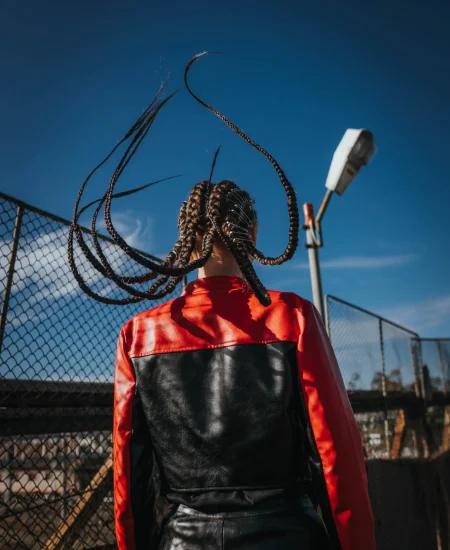 Girl with braids in air