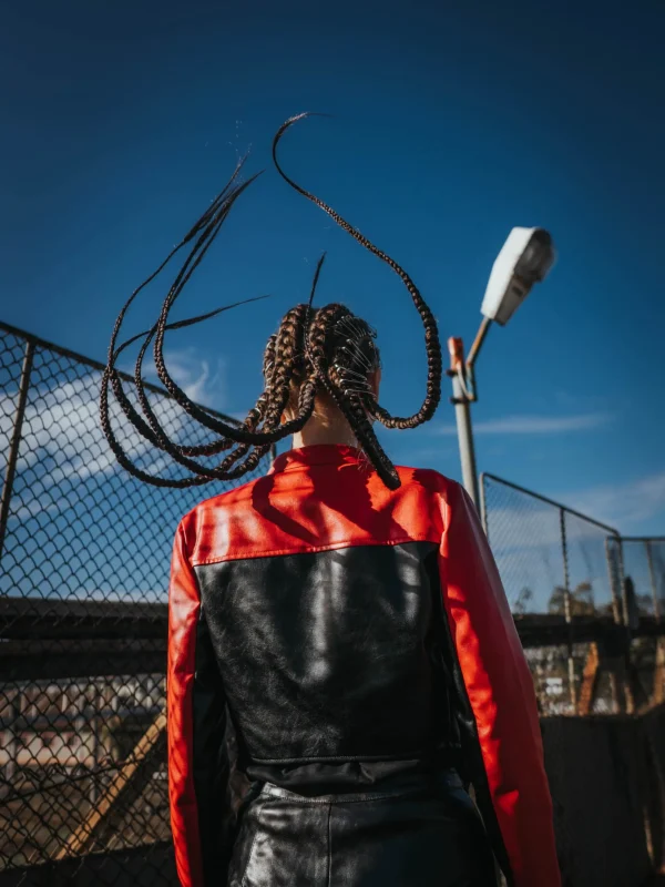 Girl with braids in air